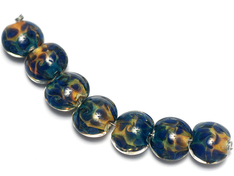 10407502 - Seven Blue & Orange Lentil Beads