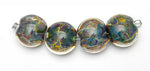 10408112 - Four Blue-green & Purple Lentil Beads