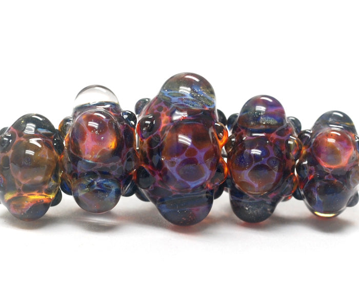 10408411 - Five Graduated Multi-Colored Rondelle Beads