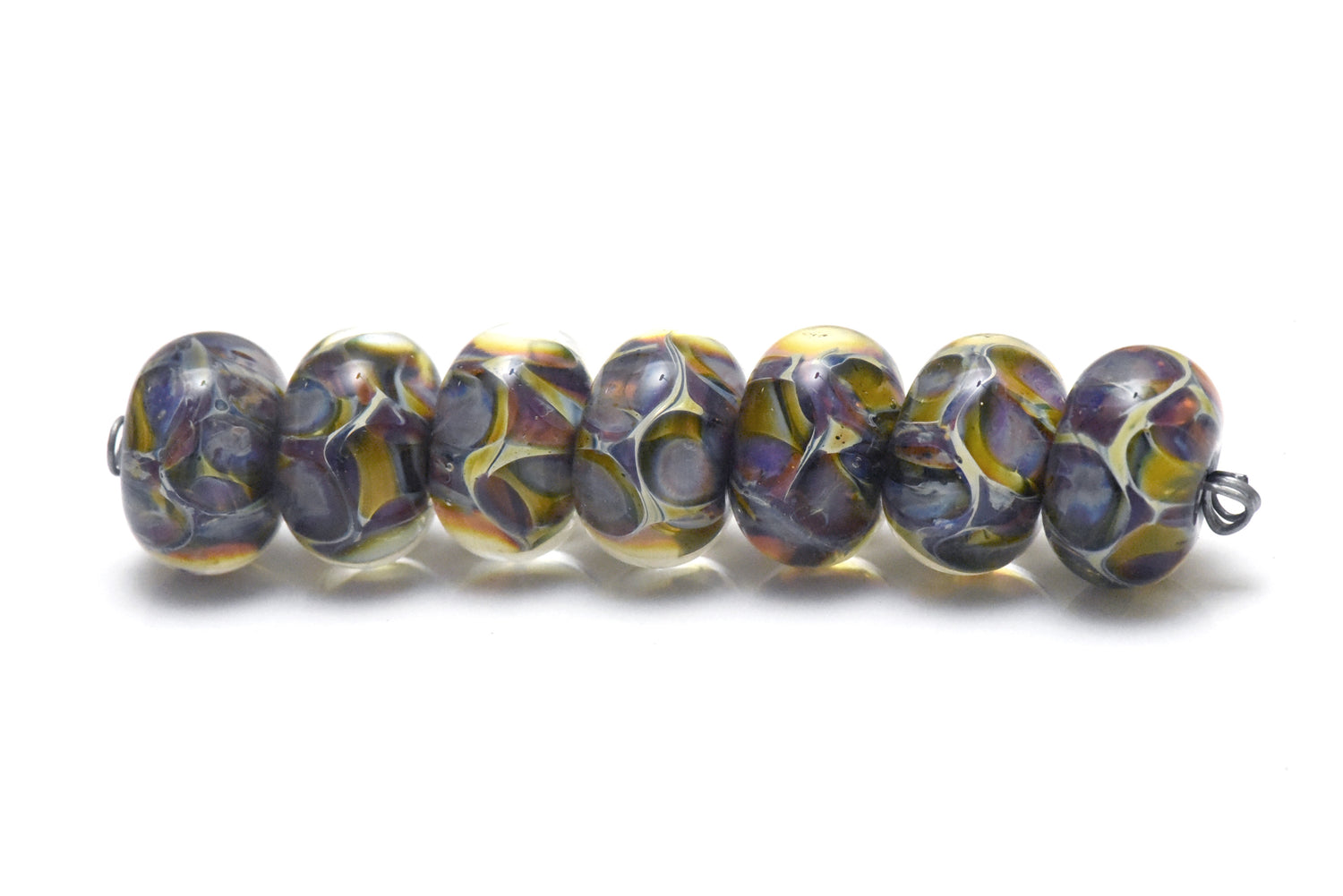 10408801 – Seven Blue-Green & Purple Borosilicate Rondelle Beads