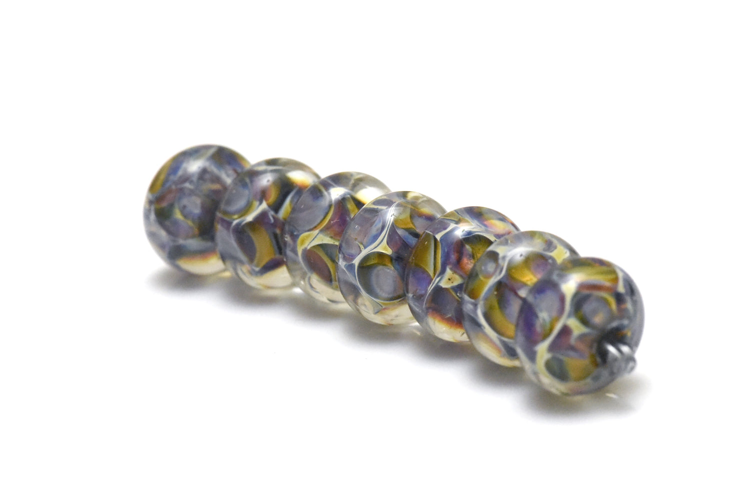 10408801 – Seven Blue-Green & Purple Borosilicate Rondelle Beads