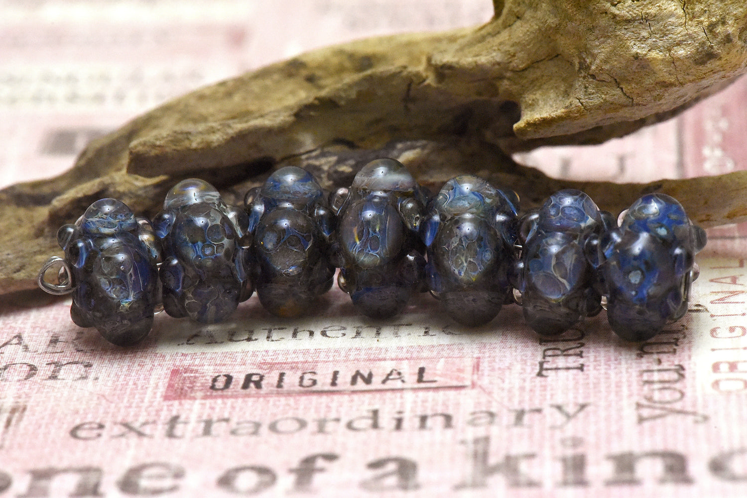 10408901 - Seven Purple & Blue Borosilicate Rondelle Beads