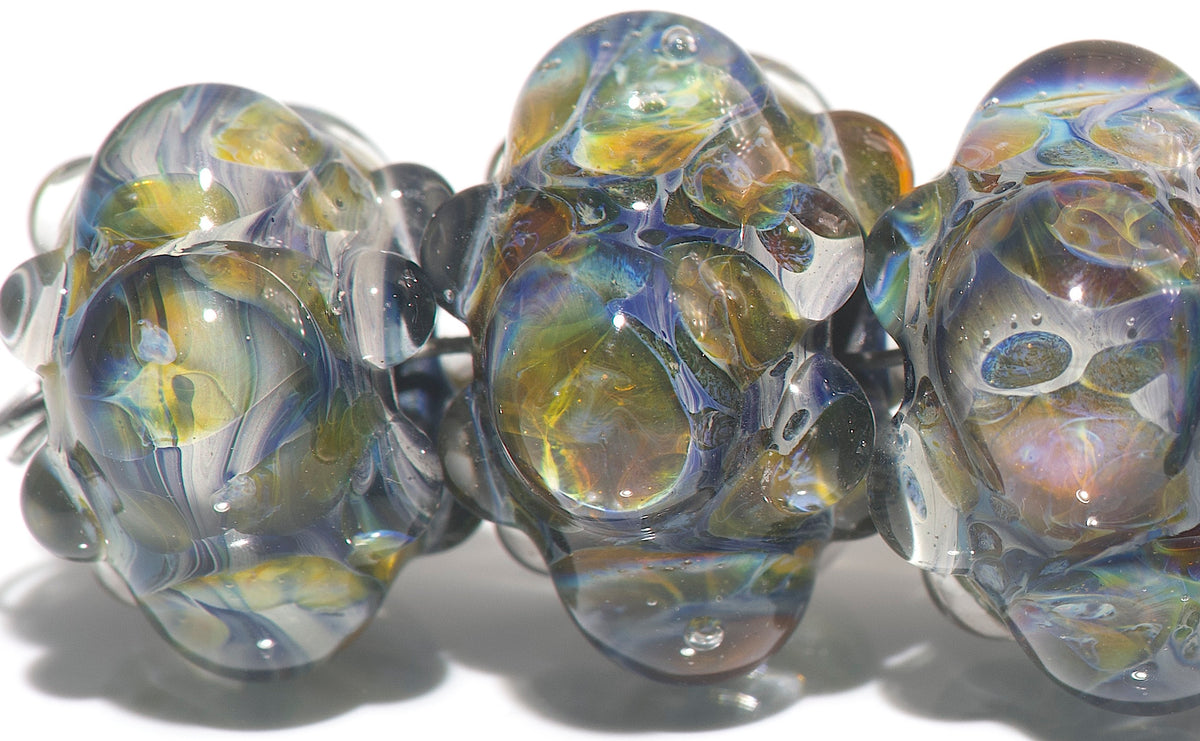 10408921-A - Six Purple & Blue Rondelle Beads