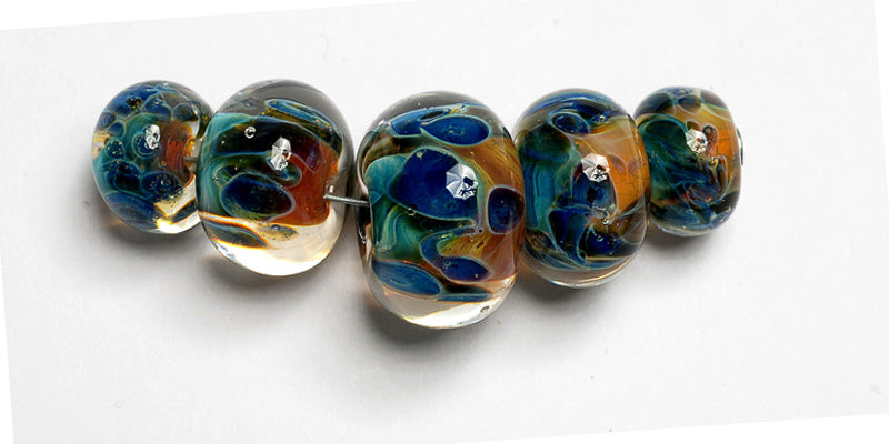 10409311 - Five Graduated Blue & Orange Rondelle Beads