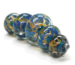 10409311 - Five Graduated Blue & Orange Rondelle Beads
