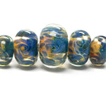 10409311 - Five Graduated Blue & Orange Rondelle Beads