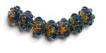 10409401 - Seven Blue & Orange Boro Rondelle Beads