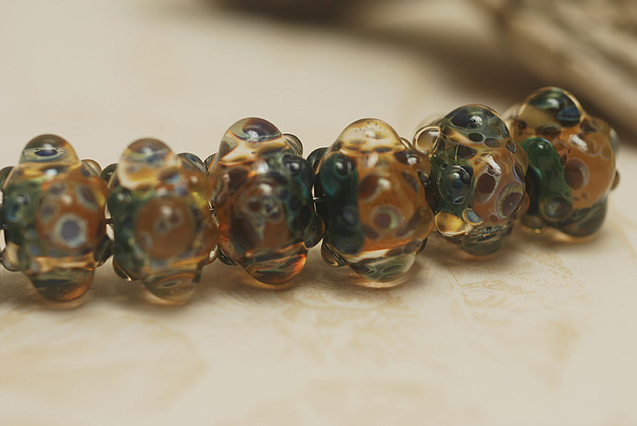 10409401 - Seven Blue & Orange Boro Rondelle Beads