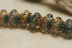 10409401 - Seven Blue & Orange Boro Rondelle Beads