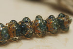 10409401 - Seven Blue & Orange Boro Rondelle Beads