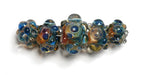 10409411 - Five Graduated Blue & Orange Boro Rondelle Beads