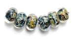 10409721 - Six Blue w/Yellow Orange Rondelle Beads