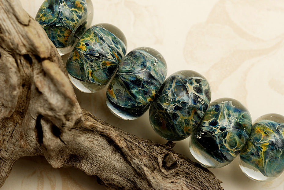 10409721 - Six Blue w/Yellow Orange Rondelle Beads
