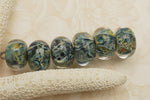10409721 - Six Blue w/Yellow Orange Rondelle Beads