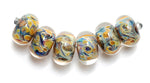 10409821 - Six Yellow w/Blue Rondelle Beads