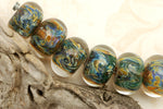 10409821 - Six Yellow w/Blue Rondelle Beads