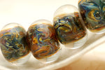 10409821 - Six Yellow w/Blue Rondelle Beads
