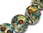10409902 - Seven Aqua Treasure Lentil Beads