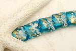 10409904 - Seven Aqua Treasure Pillow Beads