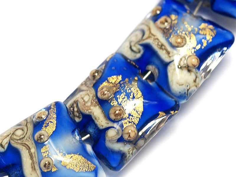 10410004 - Seven Cobalt Treasure Pillow Beads