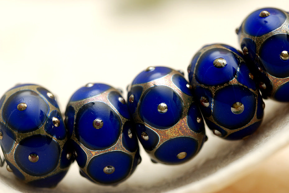 10410201 - Seven Cobalt w/Metal Dots Rondelle Beads