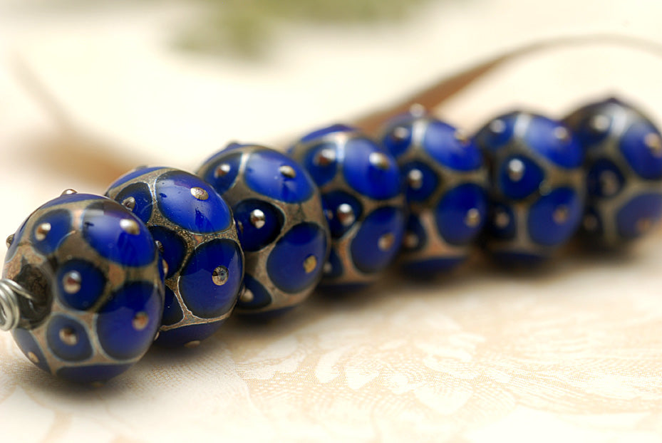 10410201 - Seven Cobalt w/Metal Dots Rondelle Beads