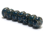 10410301 - Seven Teal w/Metal Dots Rondelle Beads