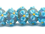 10411101 - Seven Blue Floral on Frosted Glass Rondelle Beads