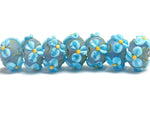 10411101 - Seven Blue Floral on Frosted Glass Rondelle Beads