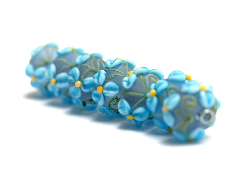 10411101 - Seven Blue Floral on Frosted Glass Rondelle Beads