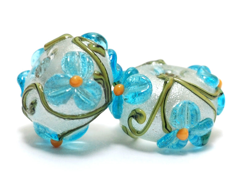 10411301 - Seven Maya Blue Flower Rondelle Beads