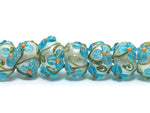 10411301 - Seven Maya Blue Flower Rondelle Beads
