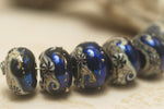 10411401 - Seven Cobalt Celestial Rondelle Beads