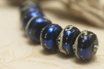 10411401 - Seven Cobalt Celestial Rondelle Beads