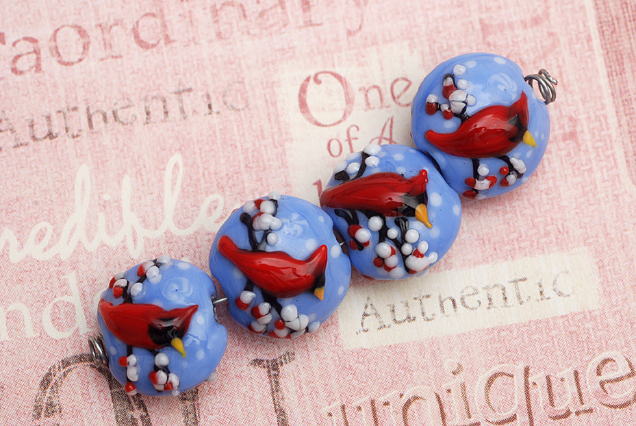 10411612 - Four Winter Red Cardinal Lentil Beads