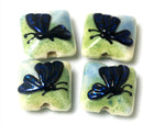 10412914 - Four Blue Sparkle Garden Butterfly Pillow Beads