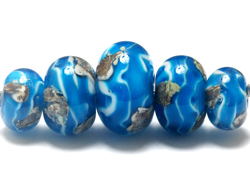 10413511 - Five Zircon Blue Treasures Graduated Rondelle Beads