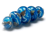 10413511 - Five Zircon Blue Treasures Graduated Rondelle Beads