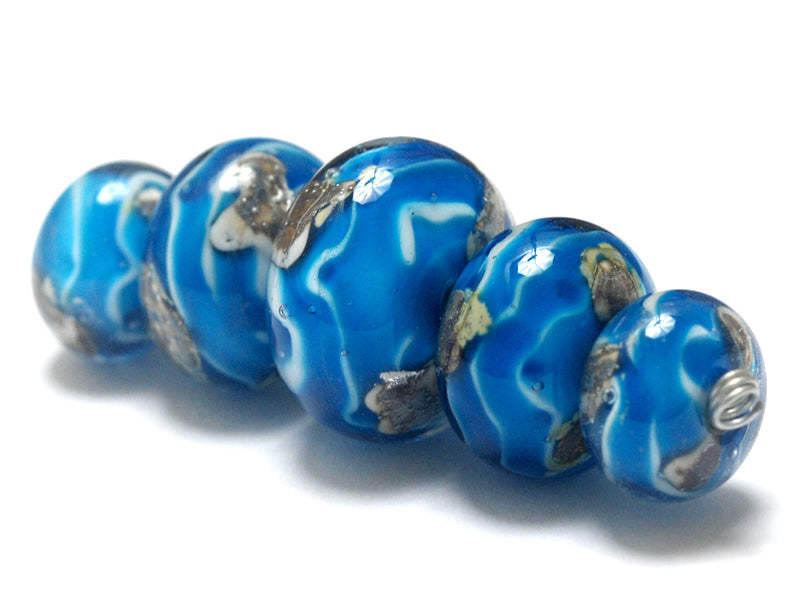 10413511 - Five Zircon Blue Treasures Graduated Rondelle Beads