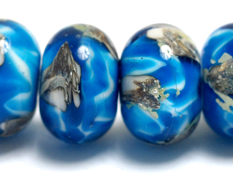 10413521 - Six Zircon Blue Treasures Rondelle Beads