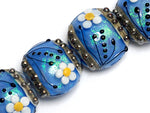 10414212 - Four Arctic Blue Florals Lentil Beads