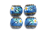 10414212 - Four Arctic Blue Florals Lentil Beads