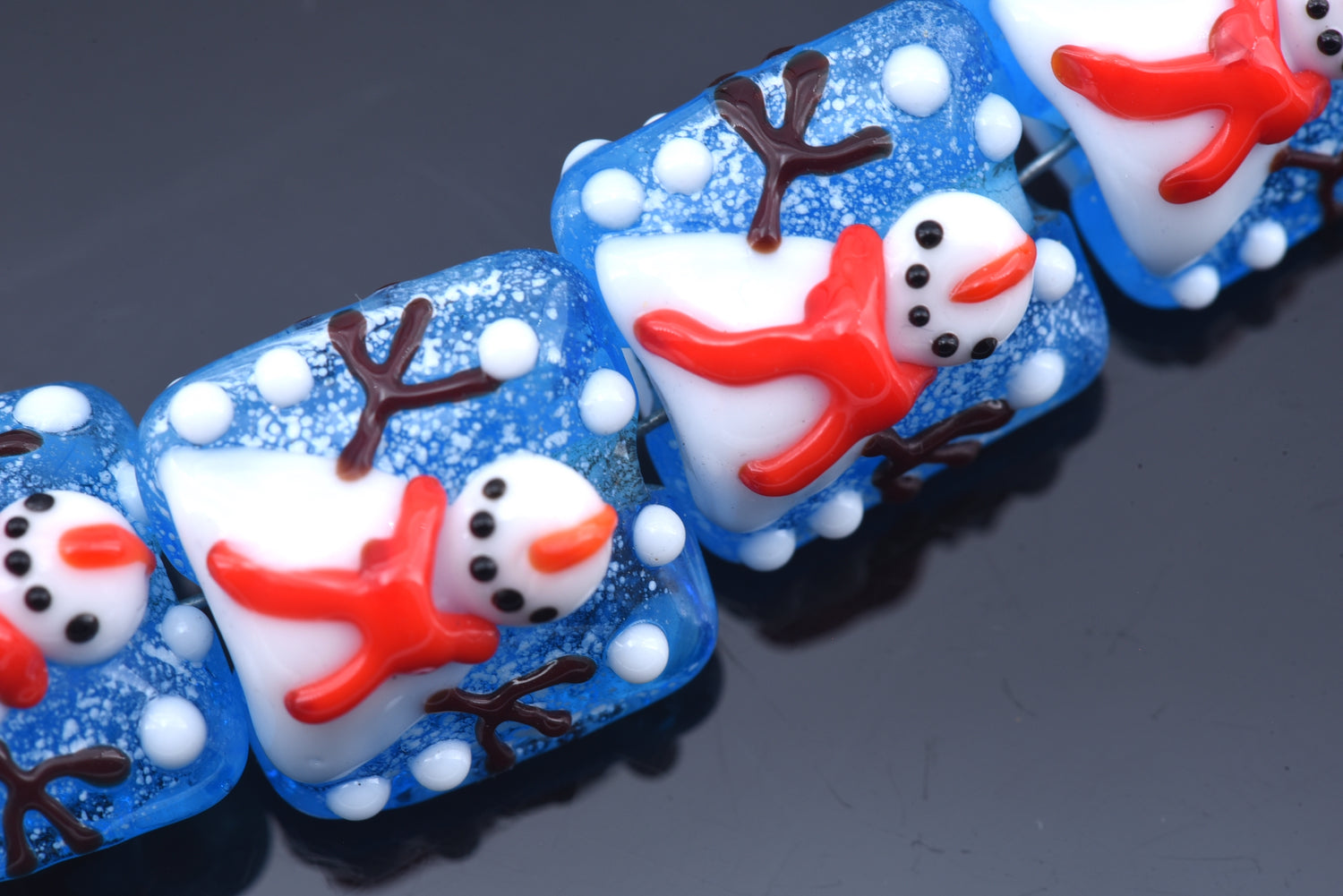10414914 - Four Juggling Snowman Pillow Beads