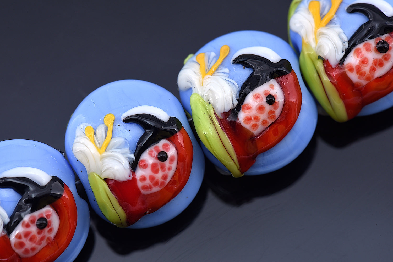 10415212 - Four Red Parrot Lentil Beads