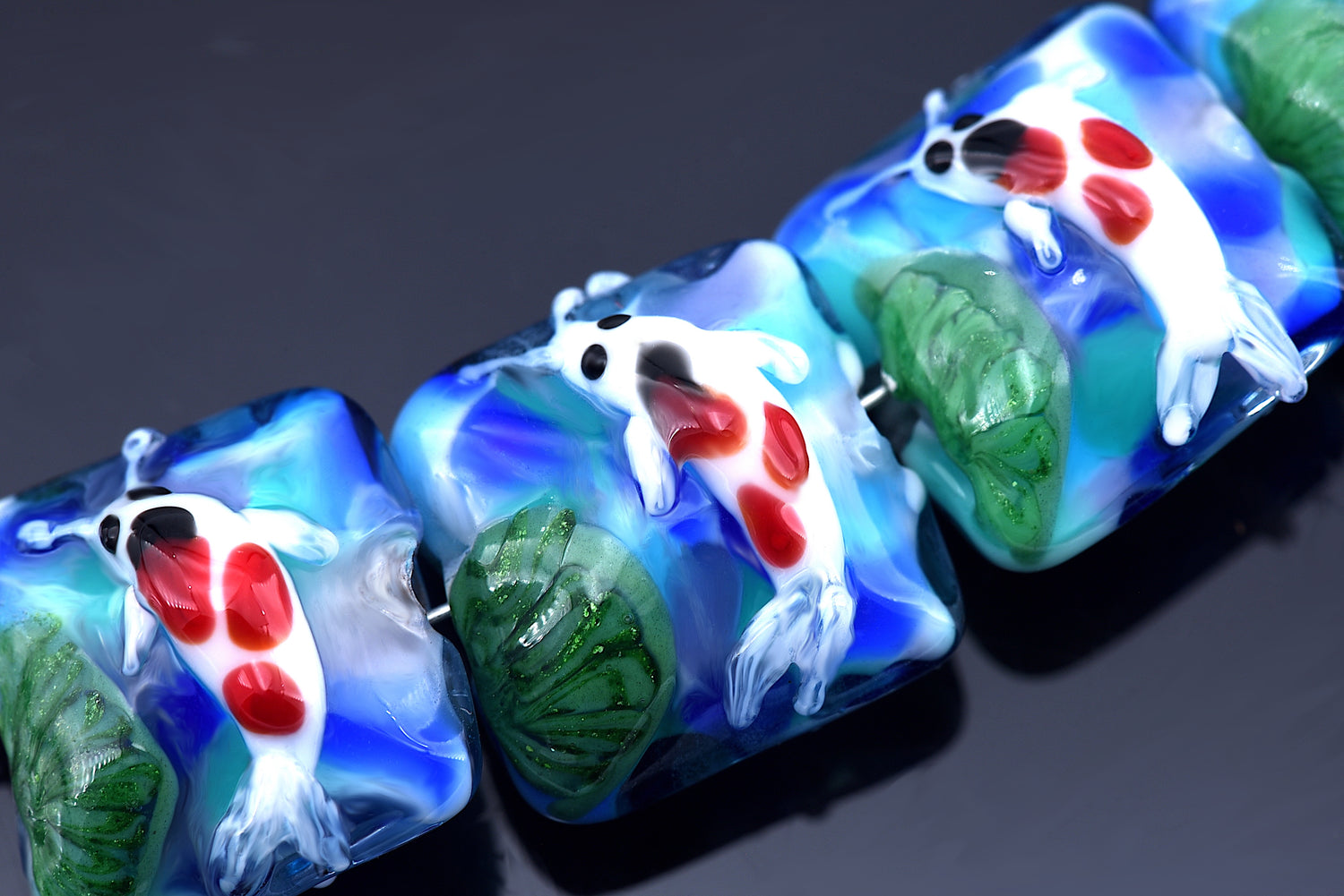 10415614 - Four Koi Fish Japanese Pond Pillow Beads