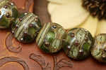10503402 - Seven Green w/Silver Foil Lentil Beads