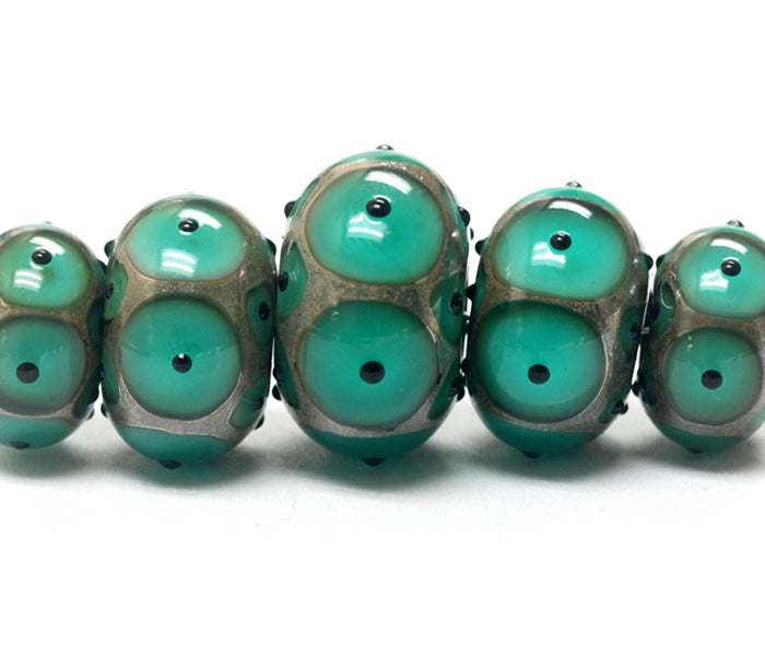 10503801 - Five Graduated Ocean Green w/Black Dots Rondelle Beads