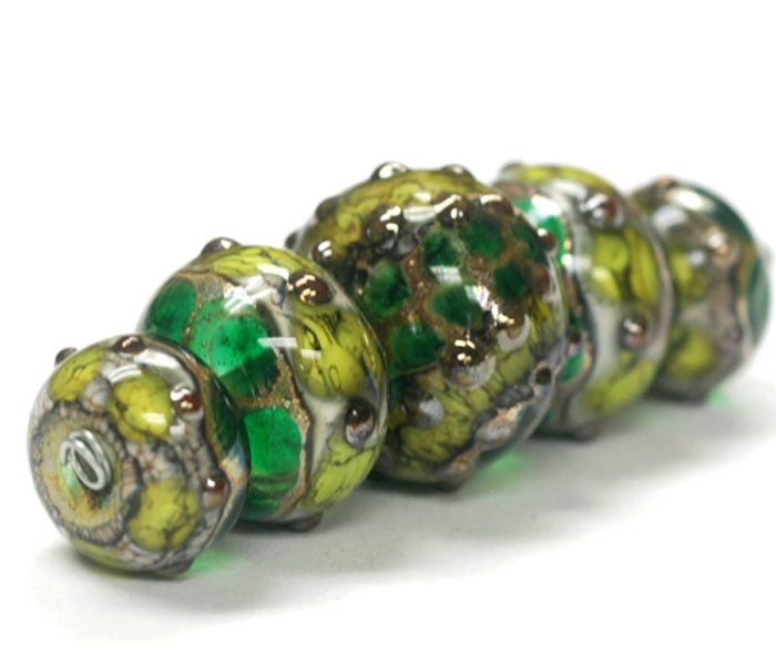 10503911 - Five Graduated Dark Green w/Silver Foil Beads