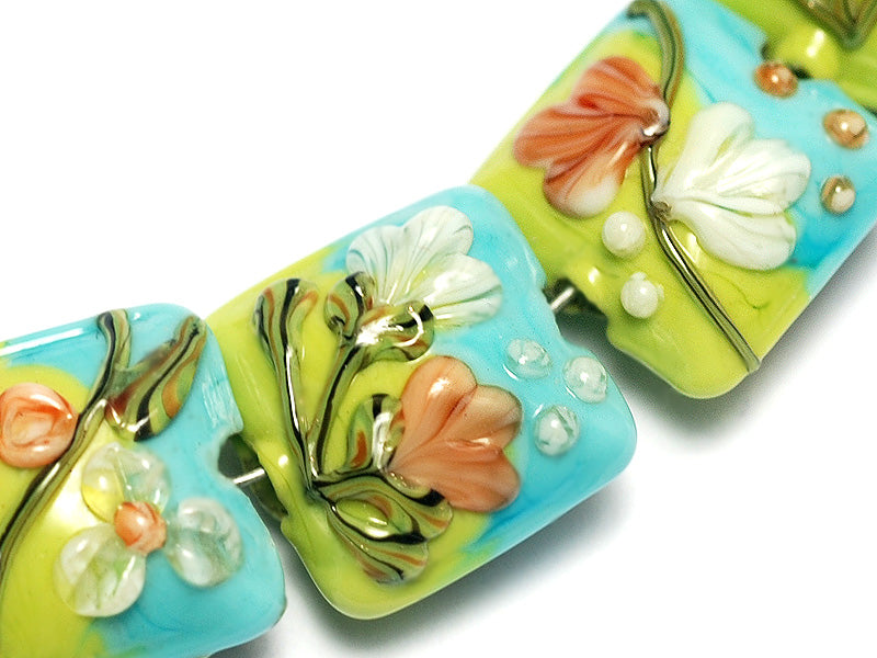 10504304 - Seven White w/Orange Flora Pillow Beads