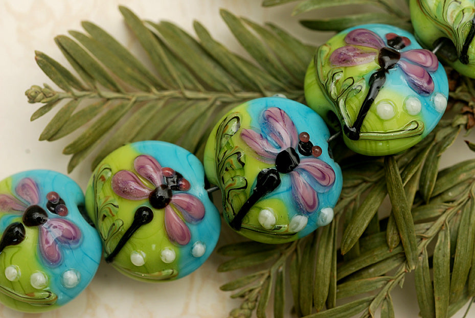 10504402 - Seven Purple Dragonfly Lentil Beads